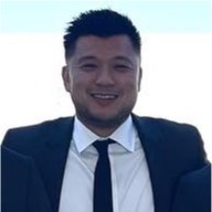 Professional headshot of Edward Hsu