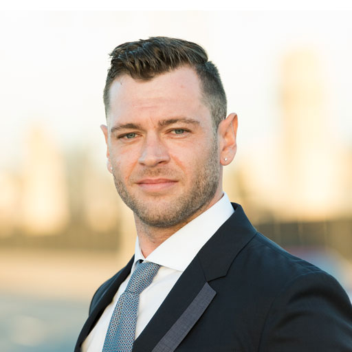 Professional headshot of Vlad Tkachenko